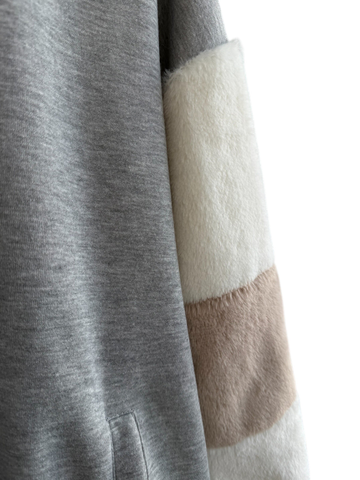 ReTrend grey zip-up sweatshirt with faux fur sleeves in white and beige, size S/M.