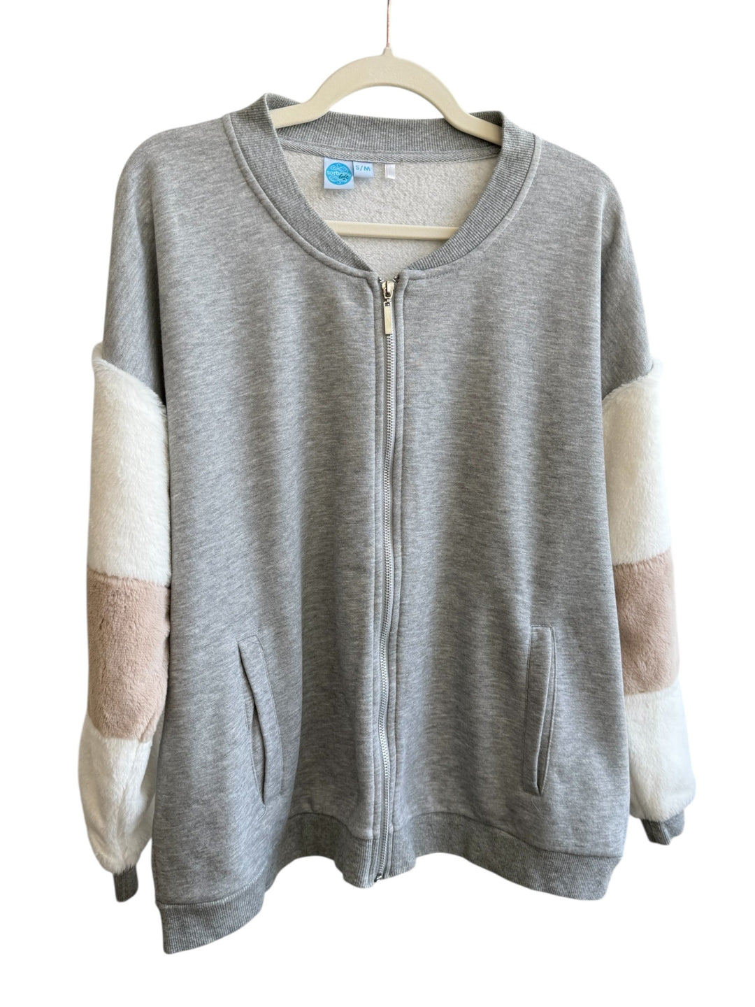 ReTrend grey zip-up sweatshirt with faux fur sleeves in white and blush pink, size S/M. Comfortable and casual.