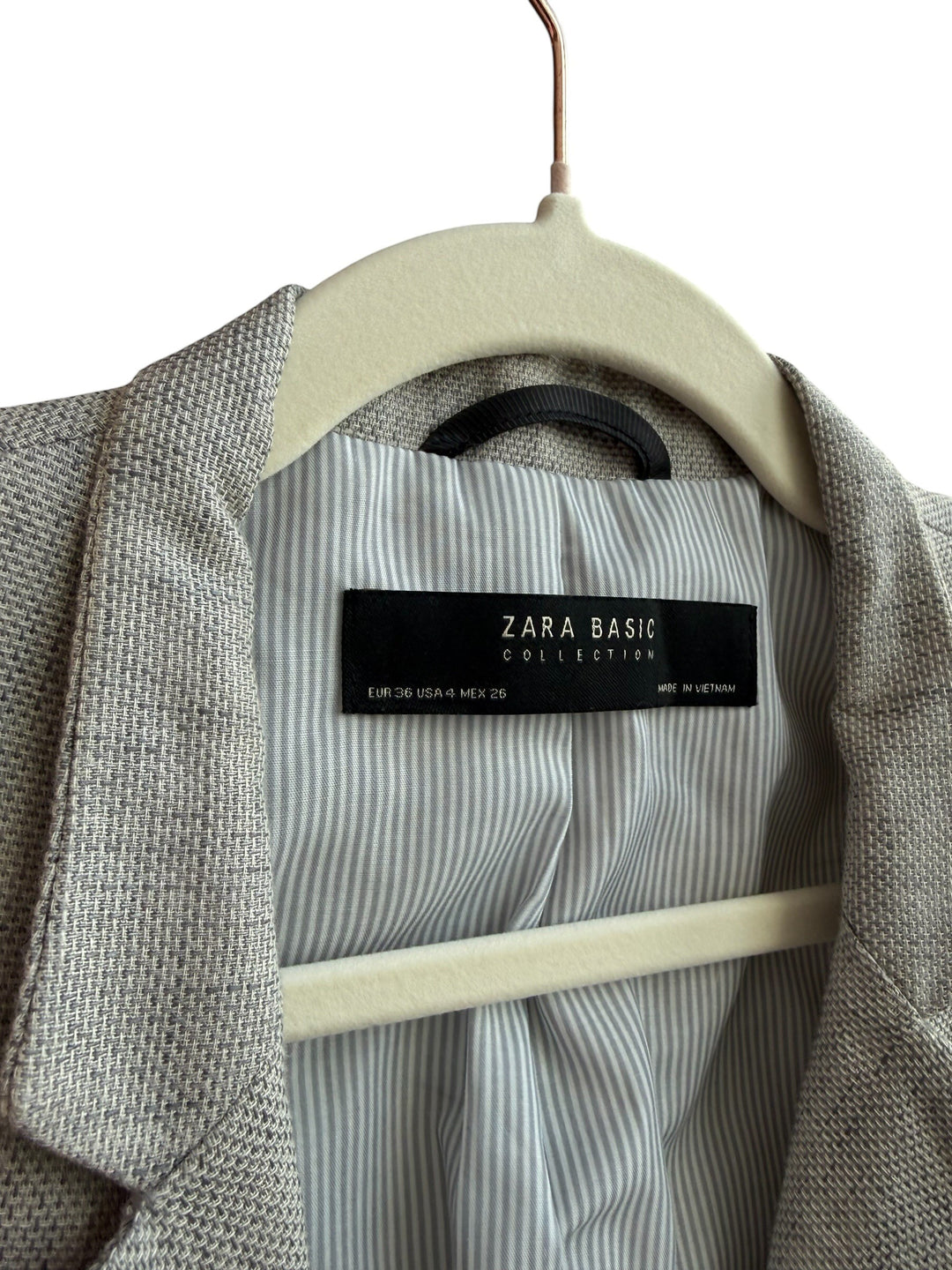 ReTrend grey marl textured blazer, size 36, with tailored collar and single button closure. Striped lining.