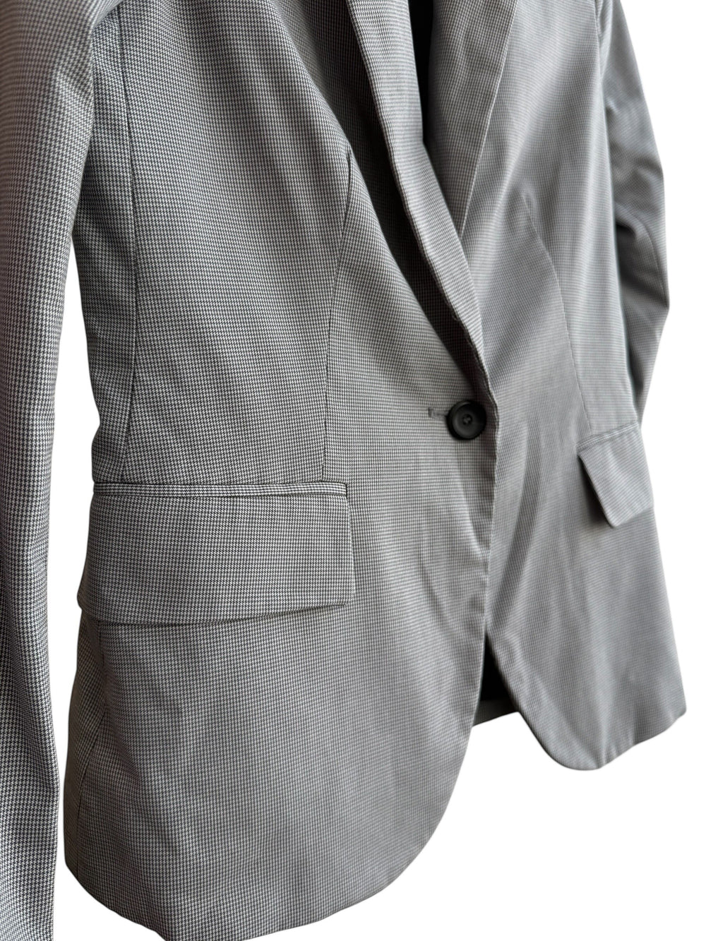 ReTrend grey micro-patterned fitted blazer with a single button, tailored collar, and flap pockets.
