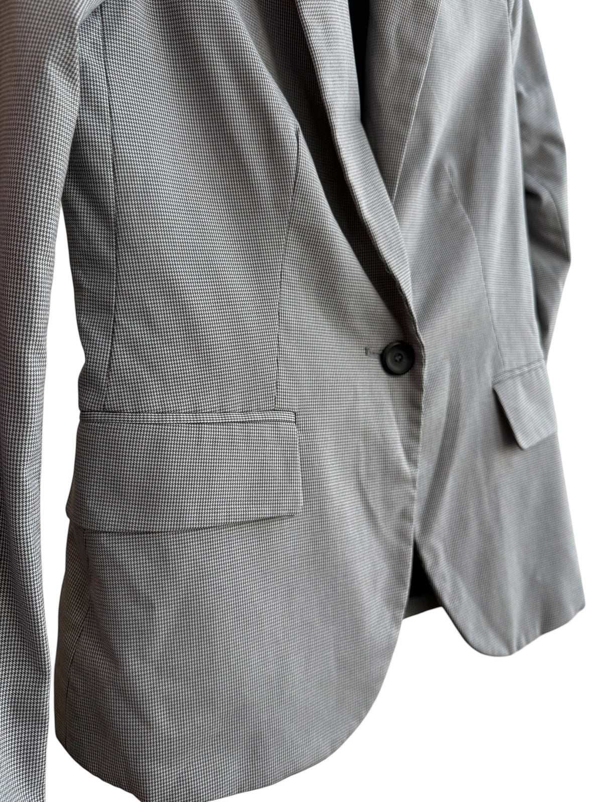 ReTrend grey micro-patterned fitted blazer with a single button, tailored collar, and flap pockets.