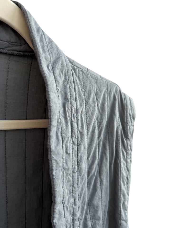 ReTrend grey quilted sleeveless vest with structured cut and tie belt, size S.