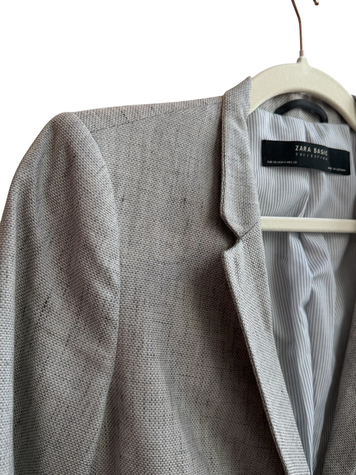 ReTrend grey marl textured blazer with tailored collar and single button closure, size 36.