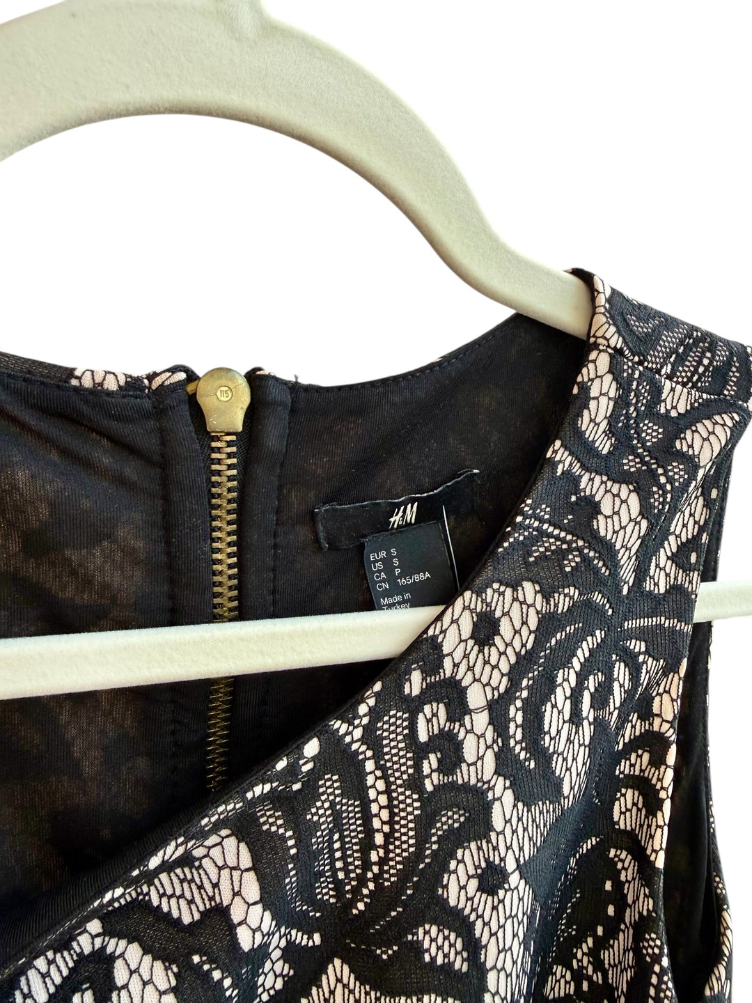 ReTrend H&amp;M black lace dress with nude lining, size S. Features a round neckline, sleeveless design, and back zip closure.