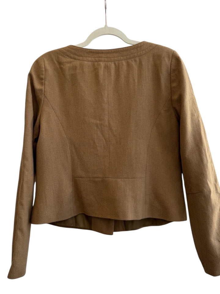 ReTrend H&amp;M camel textured short jacket with round neck, button closure, and flap pockets. Size 40/42.