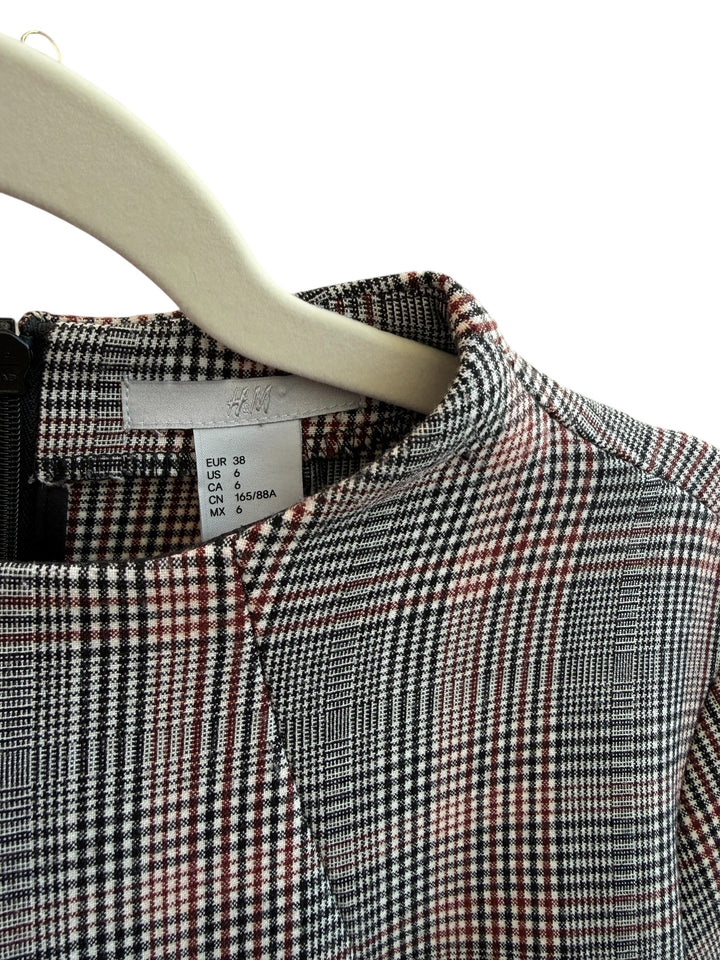 ReTrend H&amp;M grey, black, and red Prince of Wales check dress, size 38. Features short sleeves, high neck, and zip back.