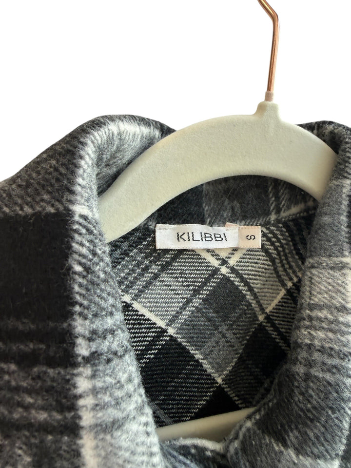 ReTrend Kilibbi black, grey, and ecru plaid overshirt with snap buttons and chest pockets, size S.