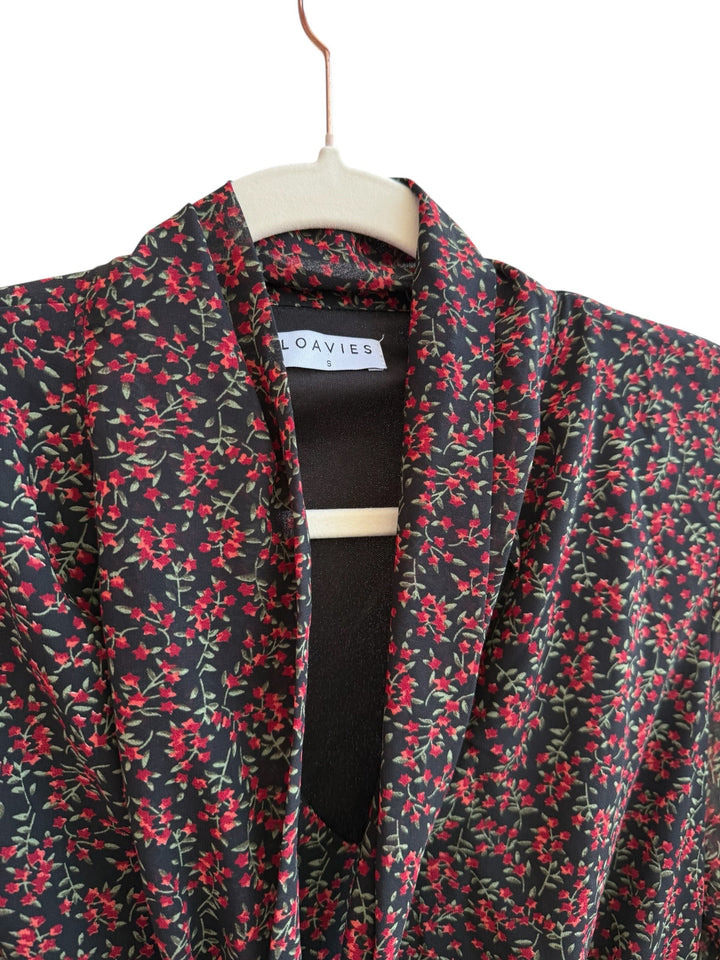 ReTrend Loavies black floral print dress with red flowers, V-neck, tie collar, and flowing skirt. Size S.