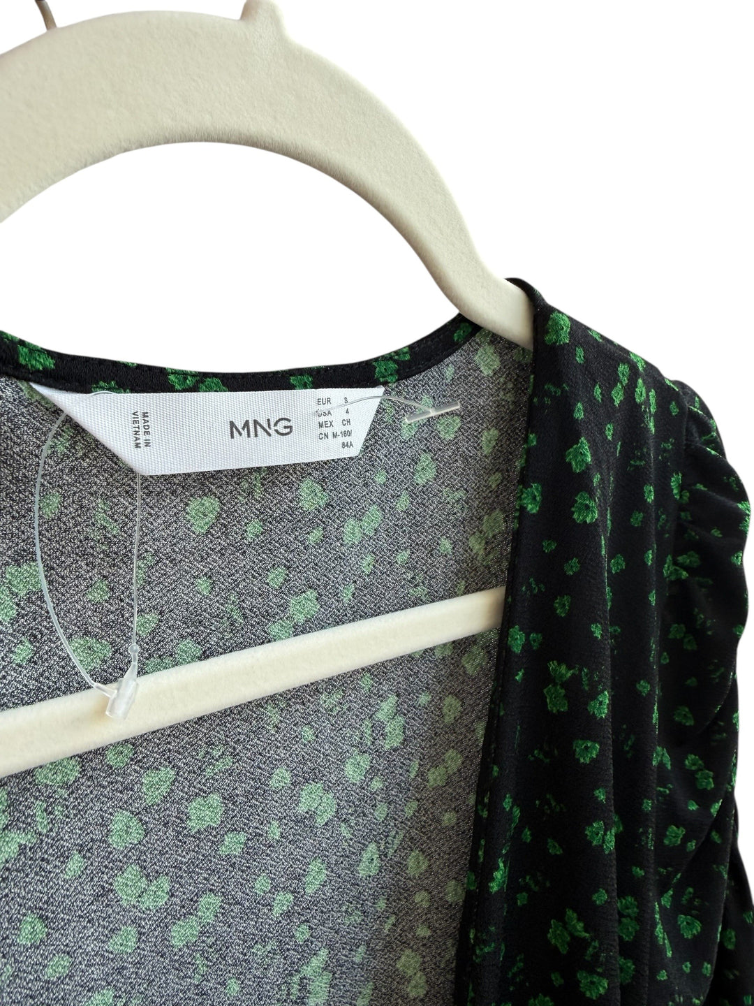 Retrend Mango black floral print wrap dress size S, with green floral pattern and tie waist.