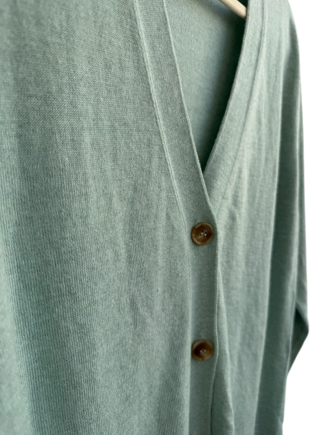 ReTrend Mango light green V-neck fine knit cardigan with button closure, size XS.