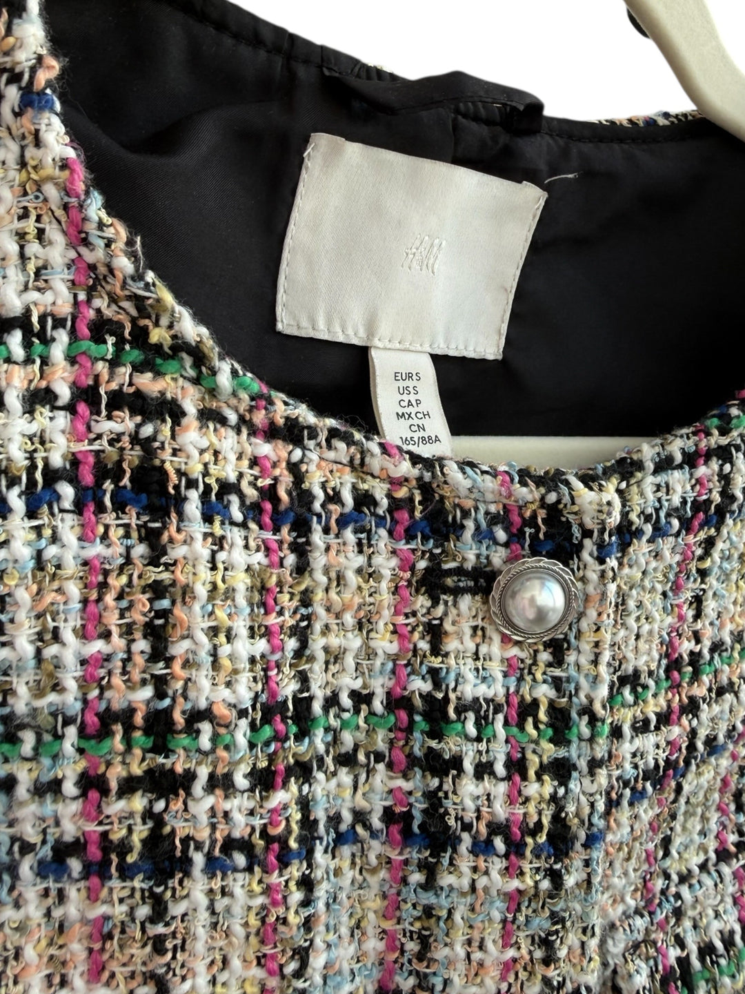 ReTrend multicolore tweed jacket, size S, with pearl button and decorative pockets. Chic, timeless style.