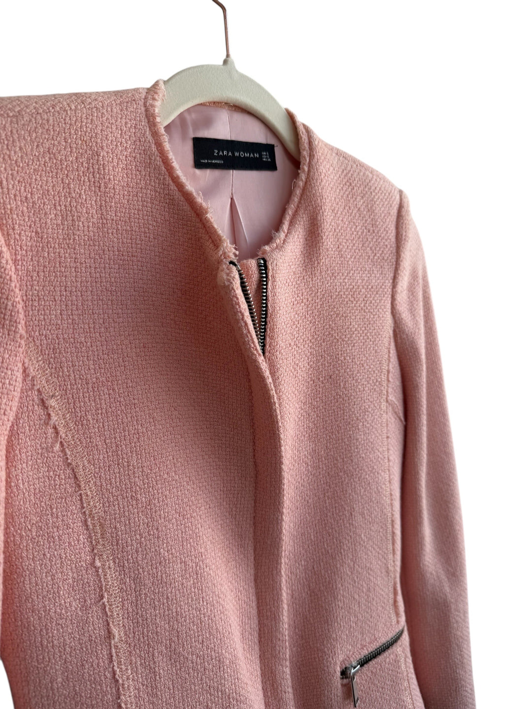 ReTrend pink textured short jacket with zip details and raw edges, size S.