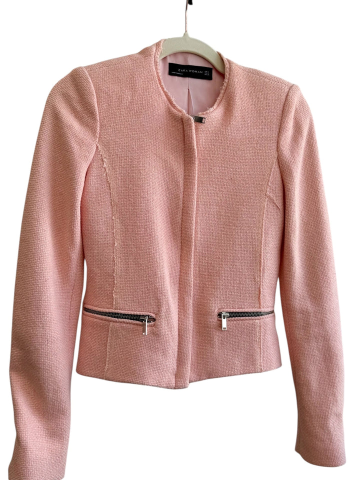 ReTrend pink textured short jacket with zip details and round neck. Elegant, fitted, and modern.