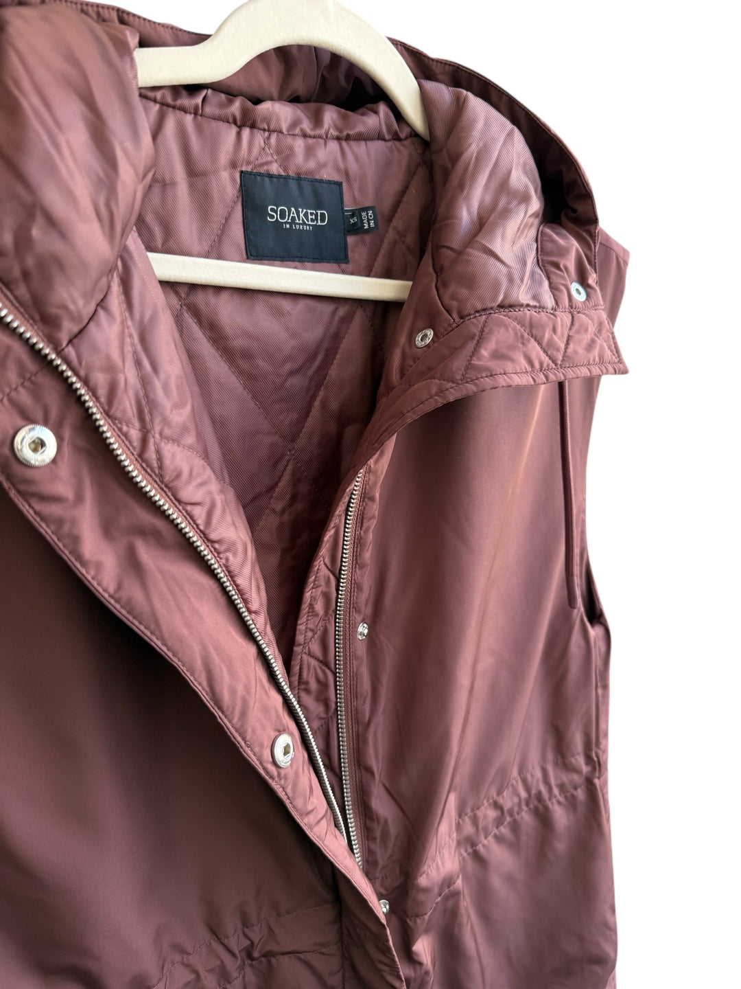 Retrend Soaked brown quilted sleeveless puffer vest with hood, zip and snap closure, size XS.
