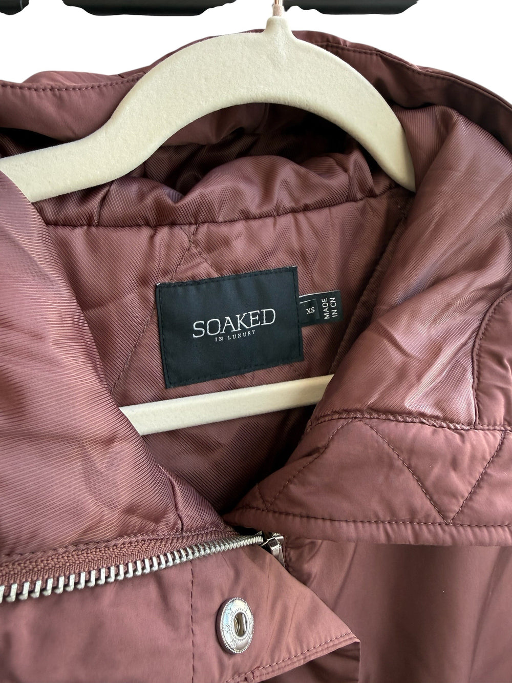 ReTrend Soaked brown quilted sleeveless puffer vest with hood, zip and snap closure. Size XS.