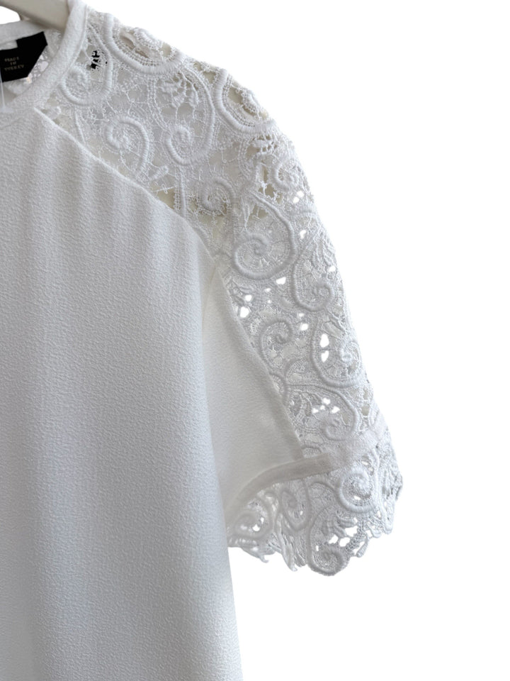 Retrend Zara white dress size XL with intricate lace sleeves, perfect for spring/summer.