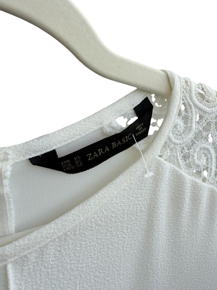 ReTrend white Zara dress size XL with intricate lace sleeves, new with tags, ideal for spring/summer.