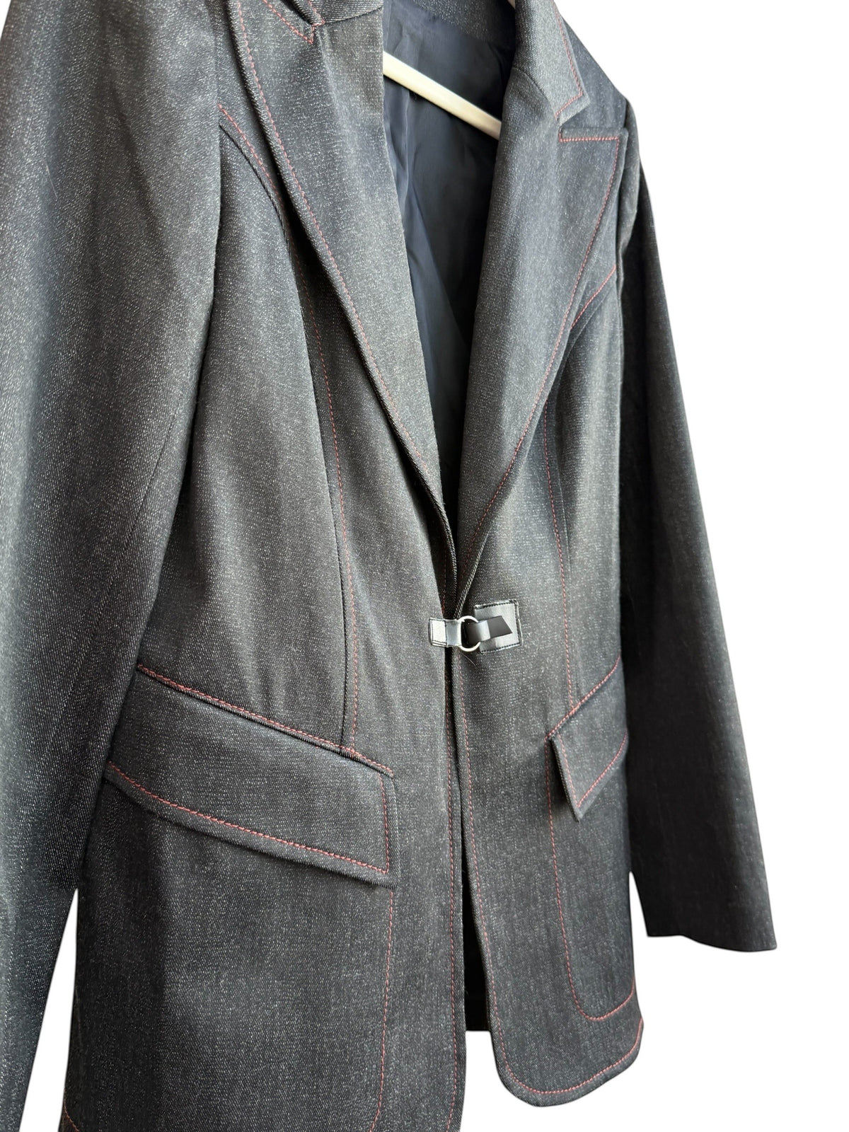 ReTrend Yugane black blazer with red contrast stitching, tailored collar, and metal clasp closure. Size 40.