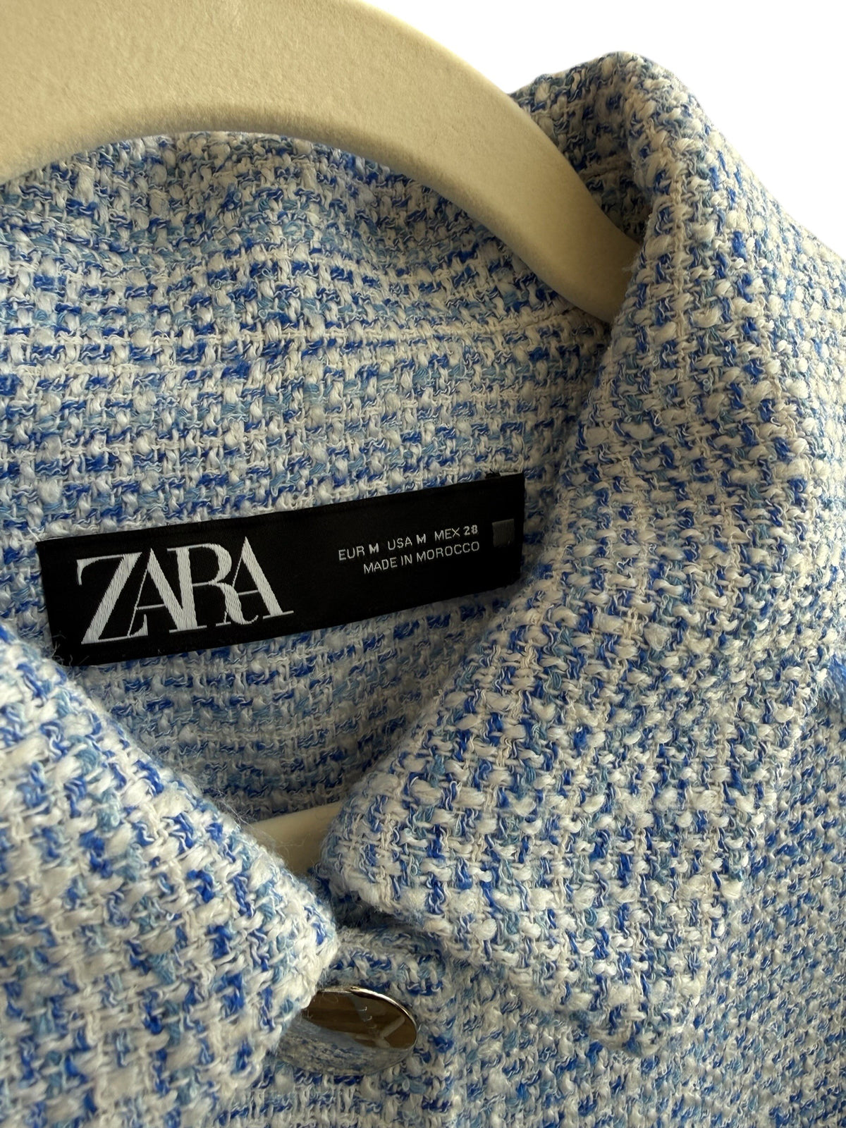 Retrend Zara light blue tweed sleeveless blazer with gold buttons and frayed finish, size M.