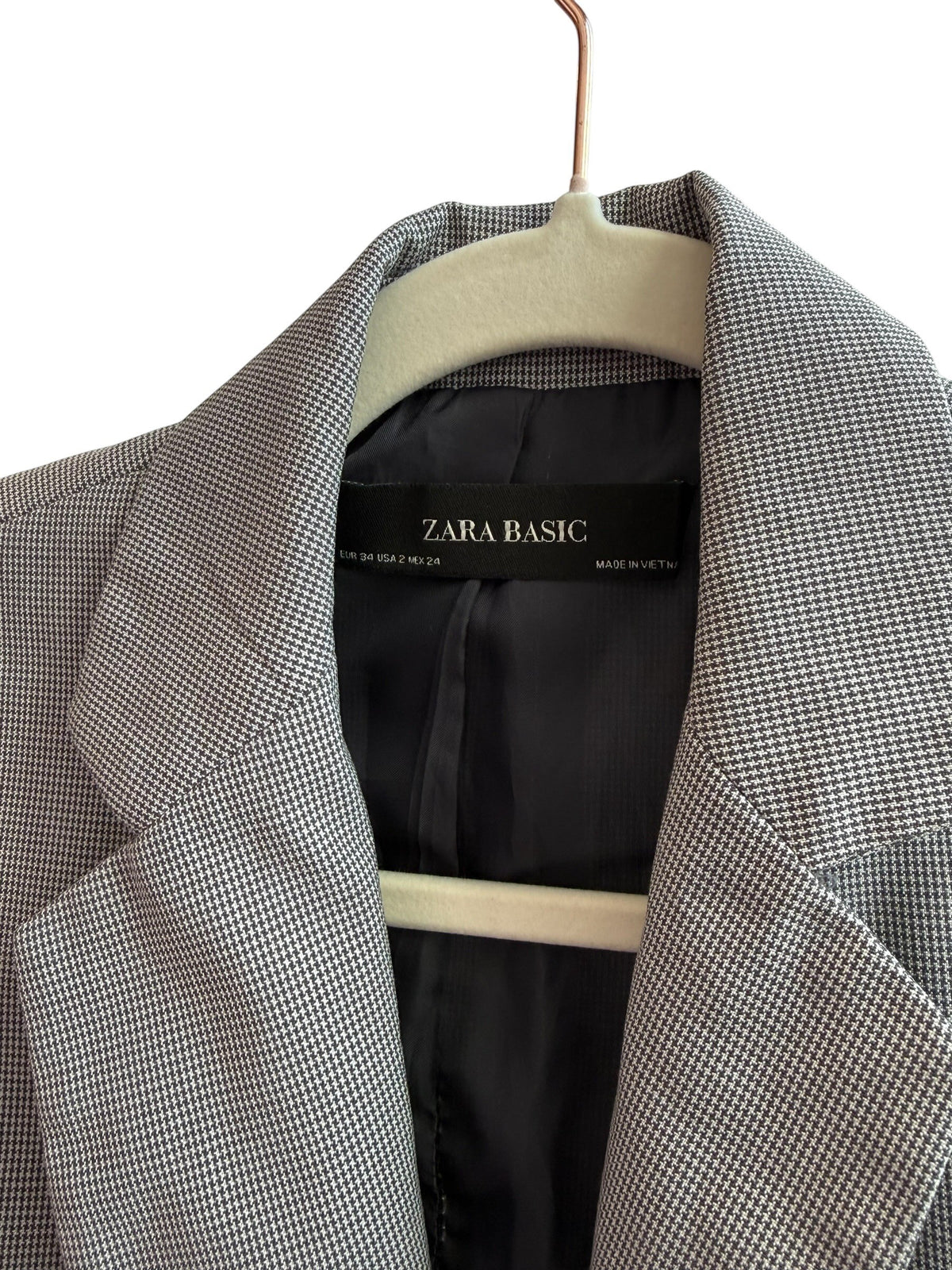 ReTrend Zara grey micro-patterned fitted blazer with a single button and tailored collar.