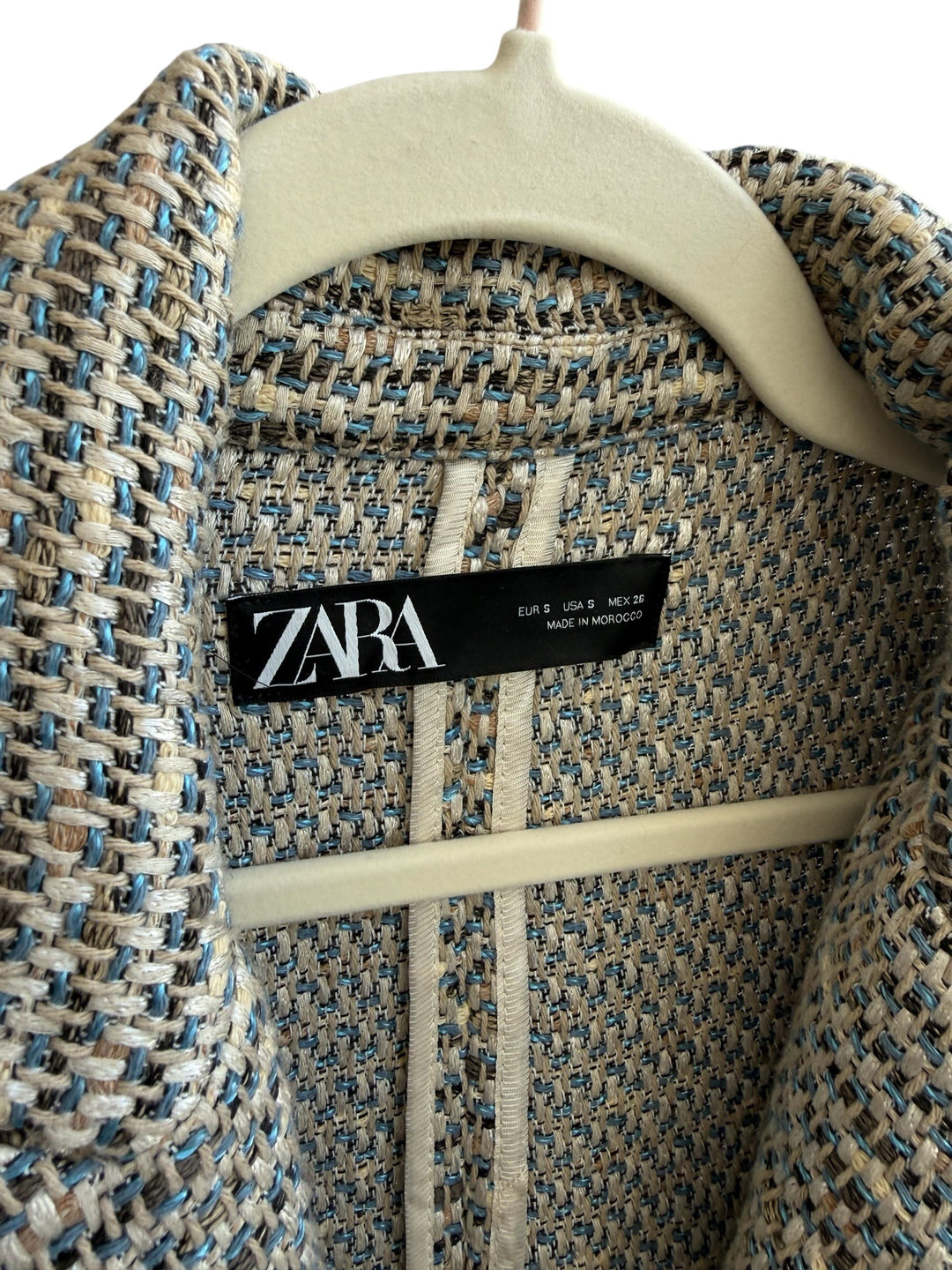 ReTrend Zara textured blazer in beige, ecru, and blue with a tailored collar and cross-button closure. Size S.